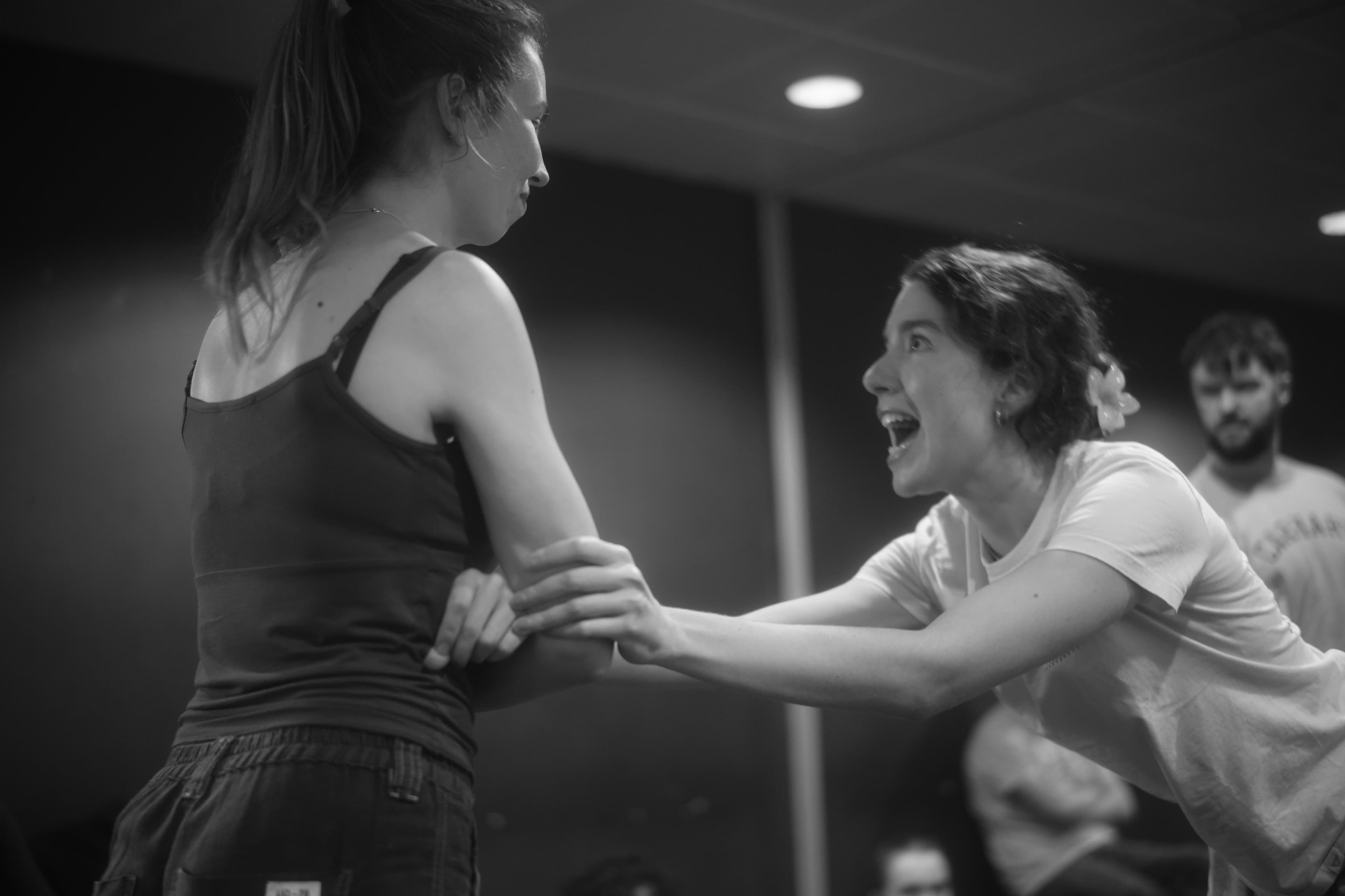 Actors rehearsing a scene